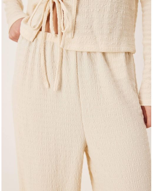 Pantalon d'ensemble ample en jersey texturé - crème Vila en coloris Natural