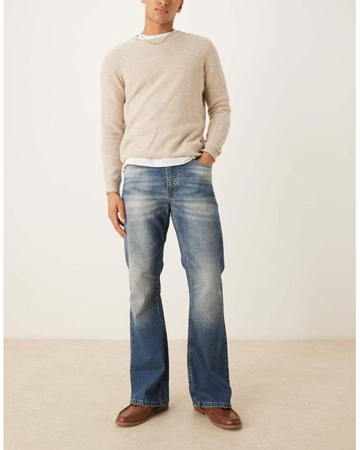 Vaqueros Azules De Pernera Ancha Acampanada Con Lavado Medio Tintado De ASOS de hombre de color Blue