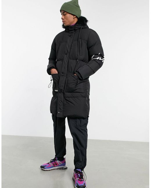The Couture Club Black Longline Panelled Puffer Jacket for men