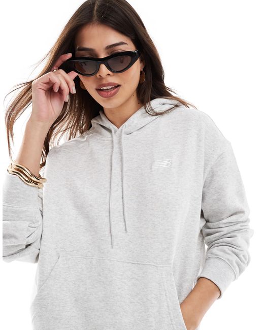 Sport essentials - sweat en tissu éponge New Balance en coloris Gray