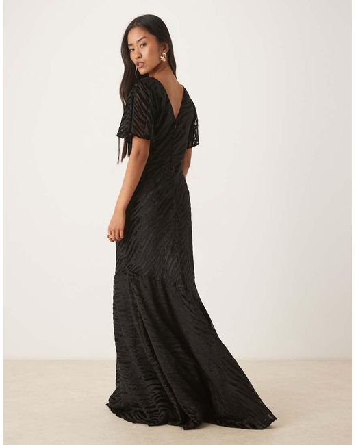 Six Stories Black Flutter Sleeve V-neck Asymmetric Dropped Hem Maxi Dress