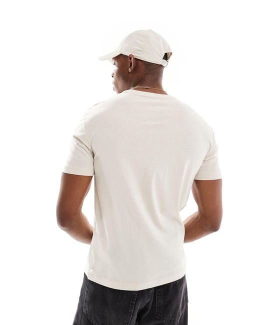 Armani - t-shirt avec grand logo à l'avant - beige EA7 pour homme en coloris White