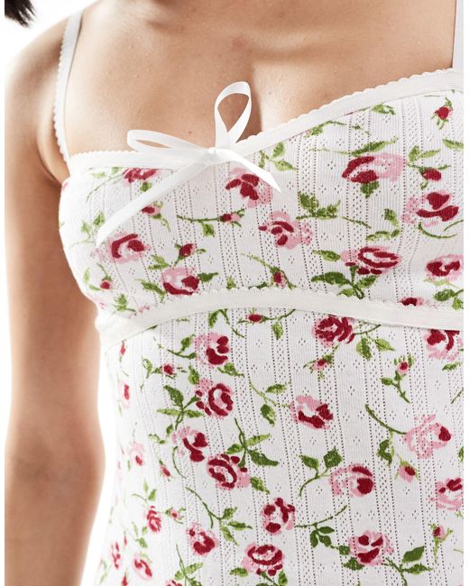 ASOS White – camisole-minikleid aus pointelle mit spitzenbesetzten trägern, schnürung und kleinem blumenmuster