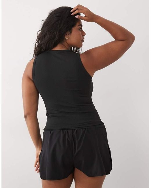 4505 Black Curve Seamless Lightweight Rib 90s Racer Vest