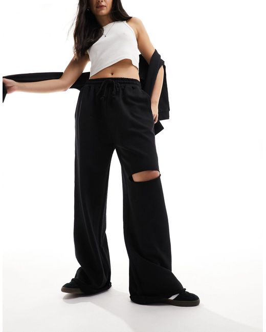 ASOS Black Wide Leg Trackies With Ripped Knee