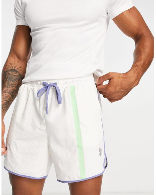 Pantalones cortos deportivos color crema con diseño South Beach de hombre  de color Blanco | Lyst