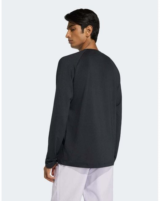 Adidas Originals Blue Tech Trefoil Essentials Poly Long Sleeve Jersey for men