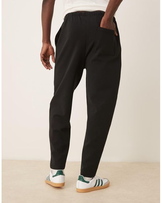 ASOS Smal Toelopende Joggingbroek Met Plooien in het Natural voor heren