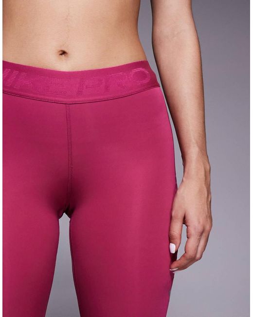 Nike Pink Nike Pro Training 365 Mid Rise leggings