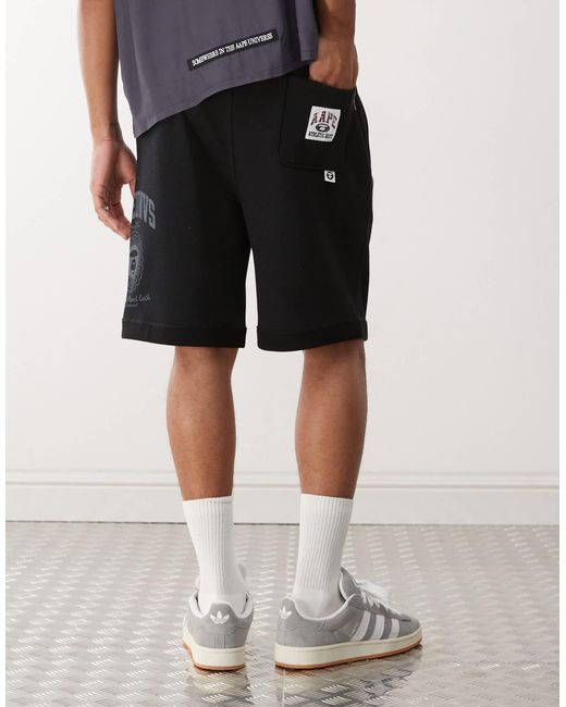 Aape by a bathing ape - short molletonné à logo Aape By A Bathing Ape pour homme en coloris White