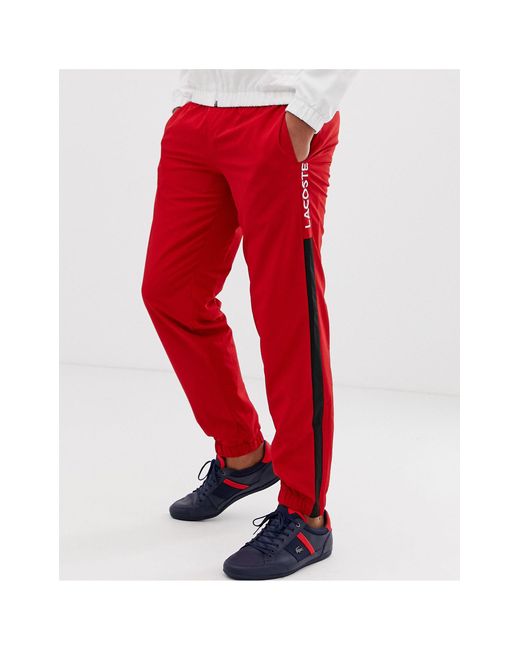 Lacoste – Jogginghose mit Seitenstreifen in Red für Herren