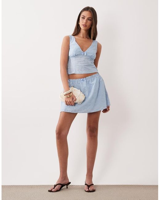 The Frolic Blue Exclusive Cotton Bow Detail Frill Mini Skirt