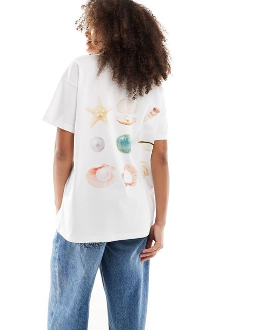 T-shirt oversize avorio con grafica di conchiglia di ASOS in White