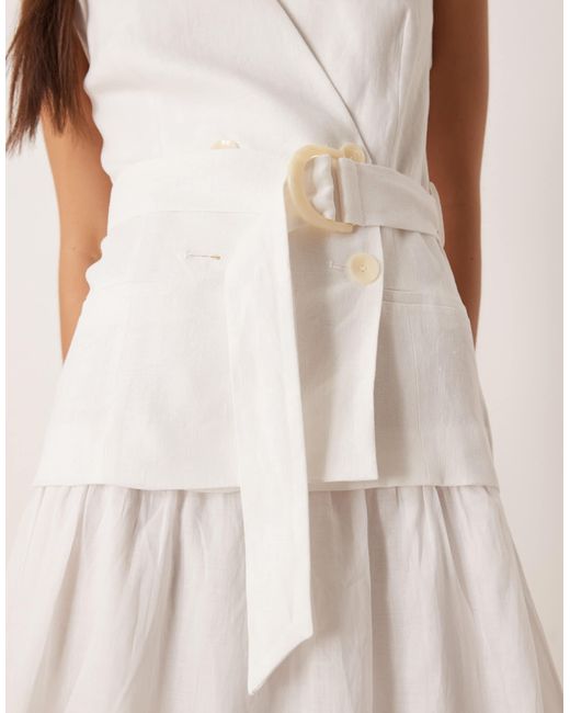 Robe longue en lin avec ceinture ajustable et détail façon veston Mango en coloris Natural
