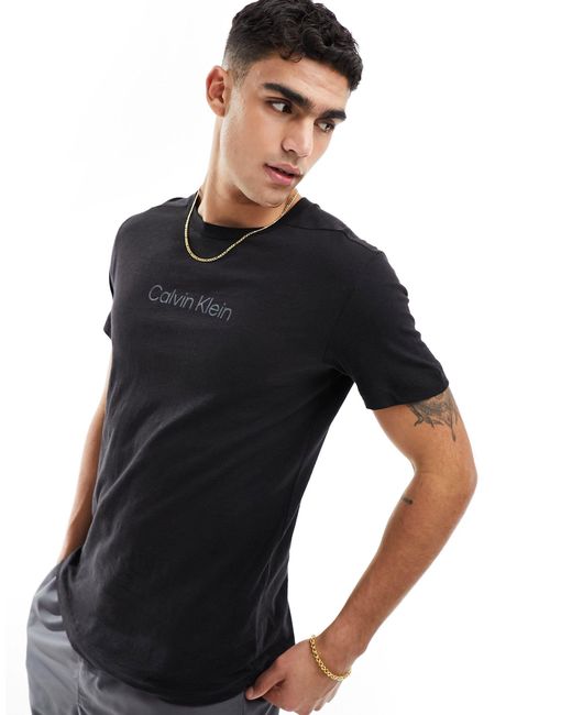Camiseta negra con cuello redondo y logo lifestyle Calvin Klein de hombre de color Black