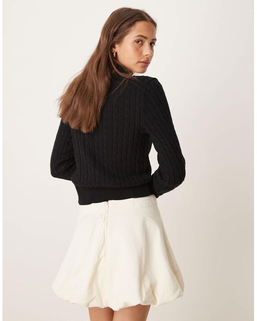 Mini-jupe bouffante en denim Mango en coloris Black