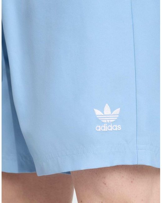 Adidas Originals Blue Adicolor 8-Inch Swim Shorts for men