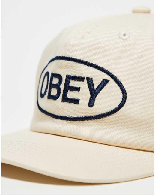 Gorra Con Diseño De 6 Paneles, Tira Trasera Y Logo Oval De Obey de color White