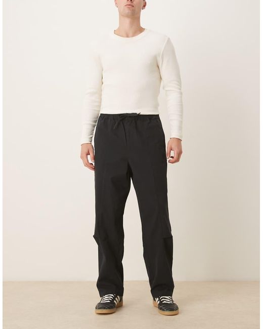 ASOS Black Relaxed Tapered Pull On Pants for men