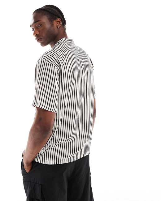 Madi - chemise décontractée unisexe rayée à manches courtes - grain noir, blanc et vert Dr. Denim en coloris Multicolor