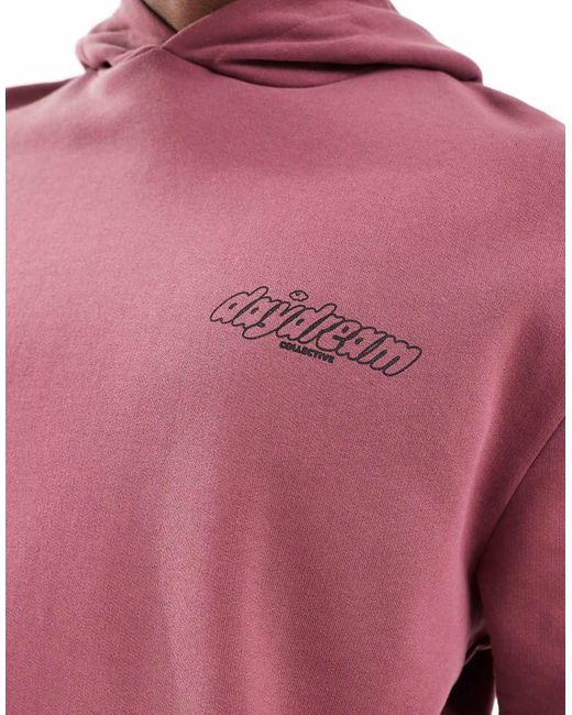 Sudadera Rosa Extragrande Con Capucha Y Estampado De Texto Y Cuadros En La Espalda De ASOS de hombre de color Red