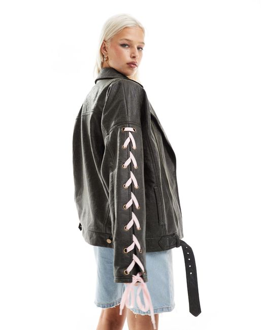 Labelrail Black X Daisy Birchall Ribbon Sleeve Distressed Faux Leather Jacket