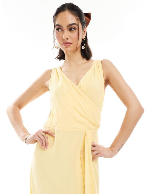 L'invitée - robe cache-cœur longue en mousseline avec jupe portefeuille - citron TFNC London en coloris Metallic