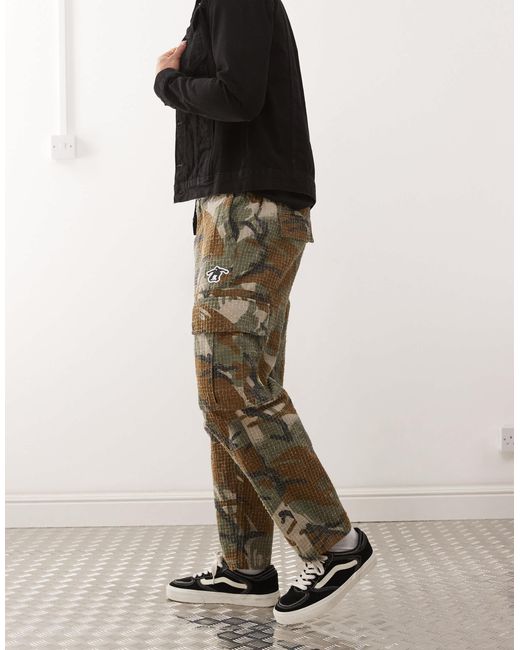 Aape By A Bathing Ape Green Aape By A Bathing Ape Loose Fit Camo Cargo Pants for men