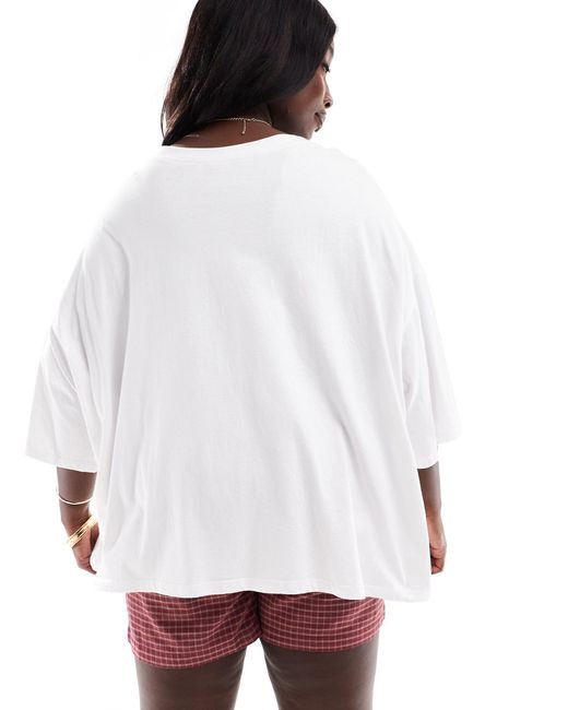 Asos design curve - t-shirt oversize bianca con grafica "nyc" con rose di ASOS in White