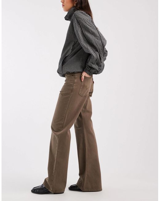 Jean bootcut ample en denim délavé Levi's en coloris Gray