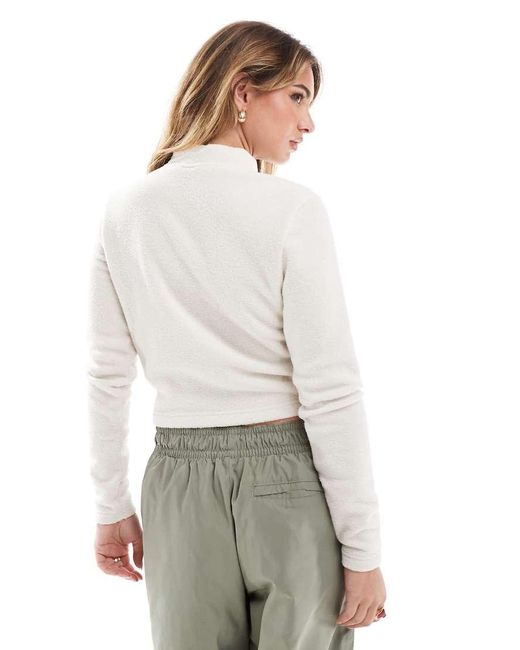 Top De Manga Larga Con Media Cremallera Phoenix Fleece De - Neutro Nike de color White