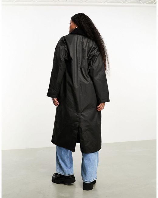 Asos design petite - trench-coat ciré avec doublure à carreaux - noir ASOS en coloris Blue