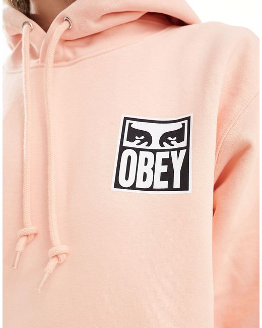 Eyes icon - sweat unisexe imprimé au dos - pêche Obey en coloris Pink