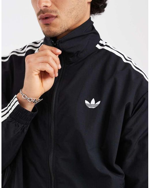 Adidas Originals Black Firebird Woven Track Top for men