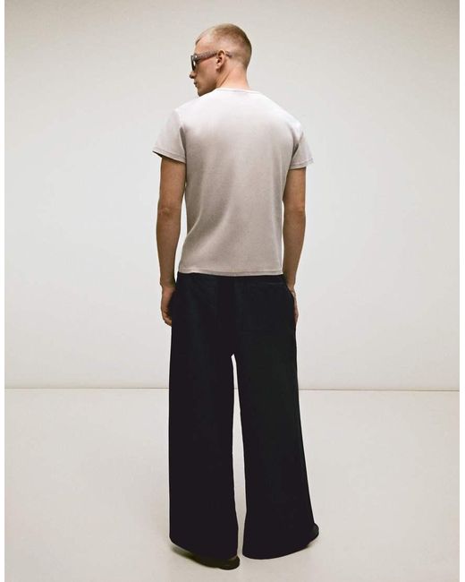 Bershka White Mega baggy Check Trousers for men