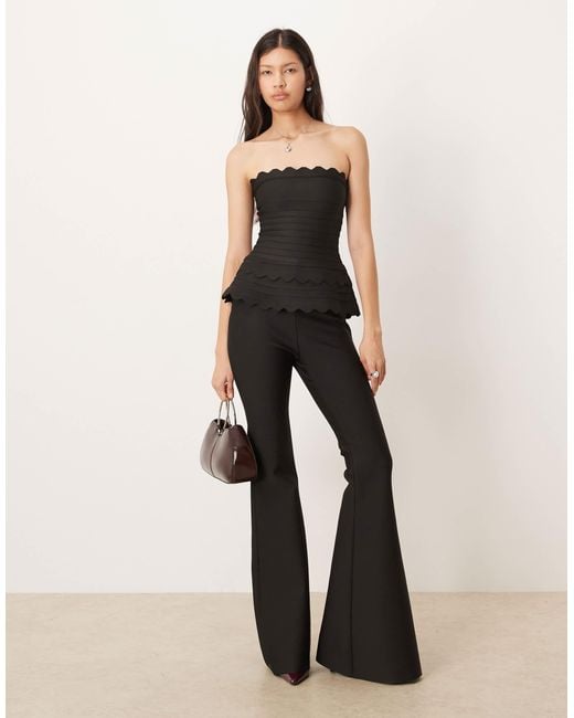 Amy Lynn White Flared Pants