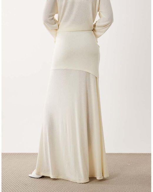 SNDY'S Natural Soft Fine Knit Semi Sheer Ruched Twist Front Detail Maxi Skirt