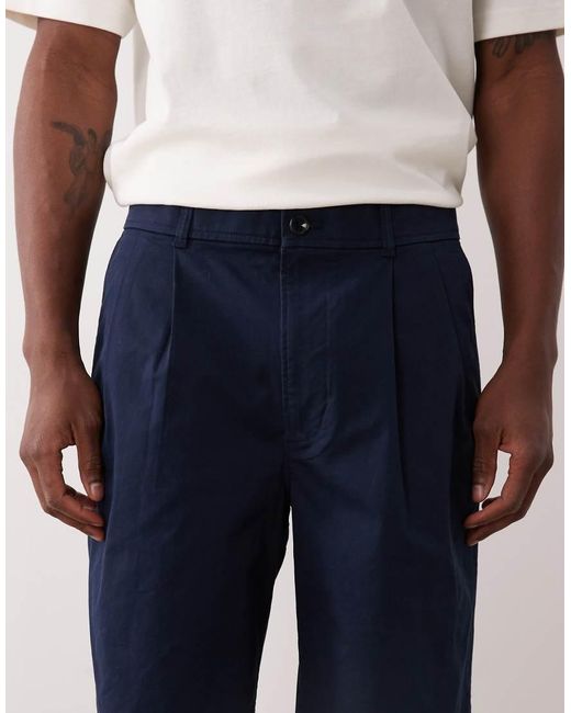 Calvin Klein Blue 9" Pleated Chino Shorts for men