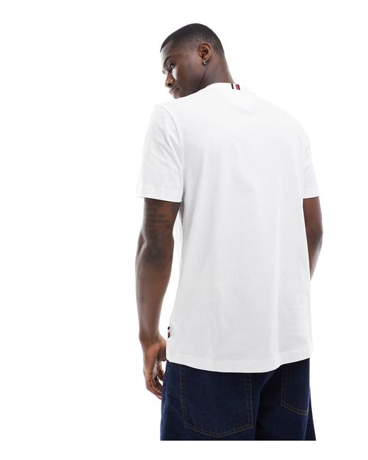 T-shirt bianca con logo "hilfiger 85" sul petto di Tommy Hilfiger in White da Uomo