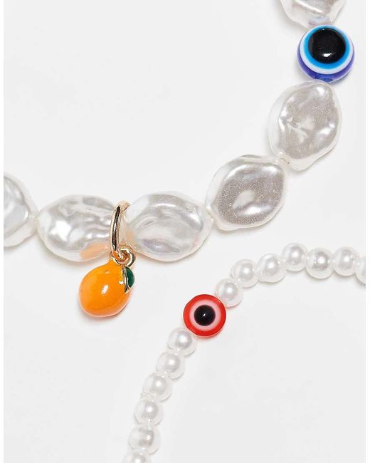 Confezione Da 2 Bracciali Con Perle Sintetiche E Perline A Forma Di Occhi di ASOS in White