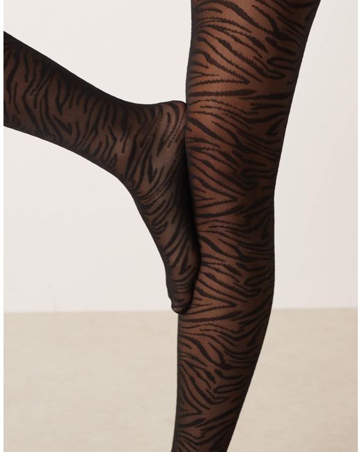 Collants à motif zébrures ASOS en coloris Black