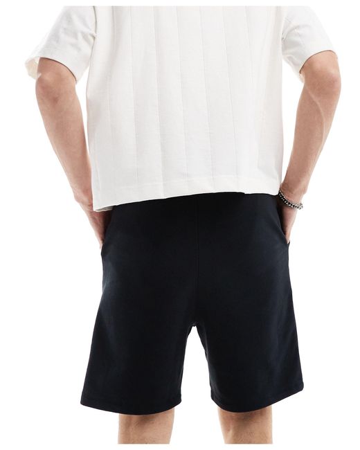 Short fonctionnel coupe slim avec poches devant ASOS pour homme en coloris Black