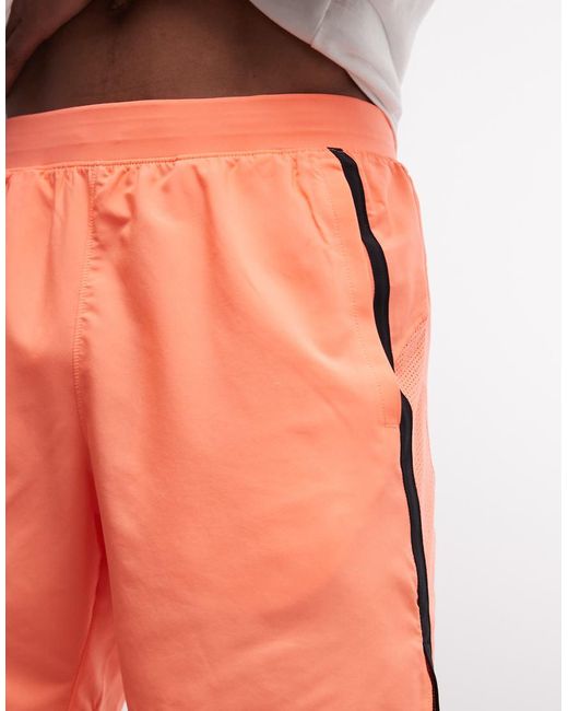 Under Armour Orange Launch 7-inch Shorts for men