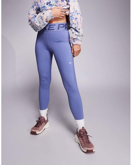 Nike di Nike in Purple