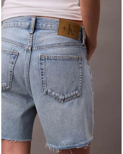 Pantalones Cortos Vaqueros Azul Claro Con Diseño Desgastado De Estilo Años 90 Signature De Calvin Klein de color Blue
