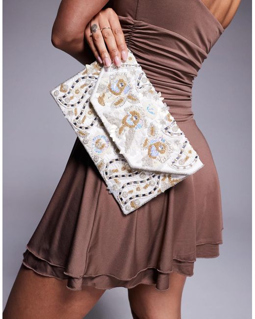 Pochette enveloppe avec motif couvert True Decadence en coloris Brown