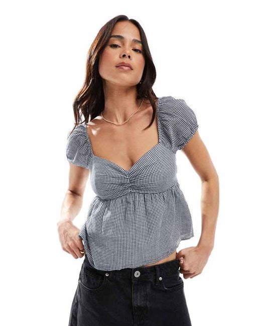 Top De Estilo Babydoll A Cuadros Negros Y Blancos Con Mangas Abullonadas Y Abertura En La Espalda De Hollister de color Gray