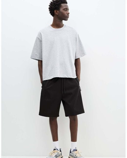 Pantaloncini Joggers Stile Bermuda Neri di Pull&Bear in White da Uomo