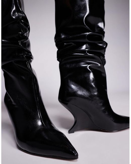 Cheryl - bottes compensées souples ASOS en coloris Black