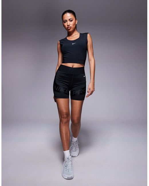 Pro - débardeur court en tissu dri-fit Nike en coloris Blue